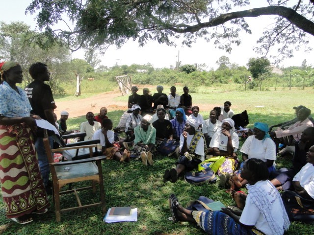 Community group meeting in Kenya. Photo credit: CARE
